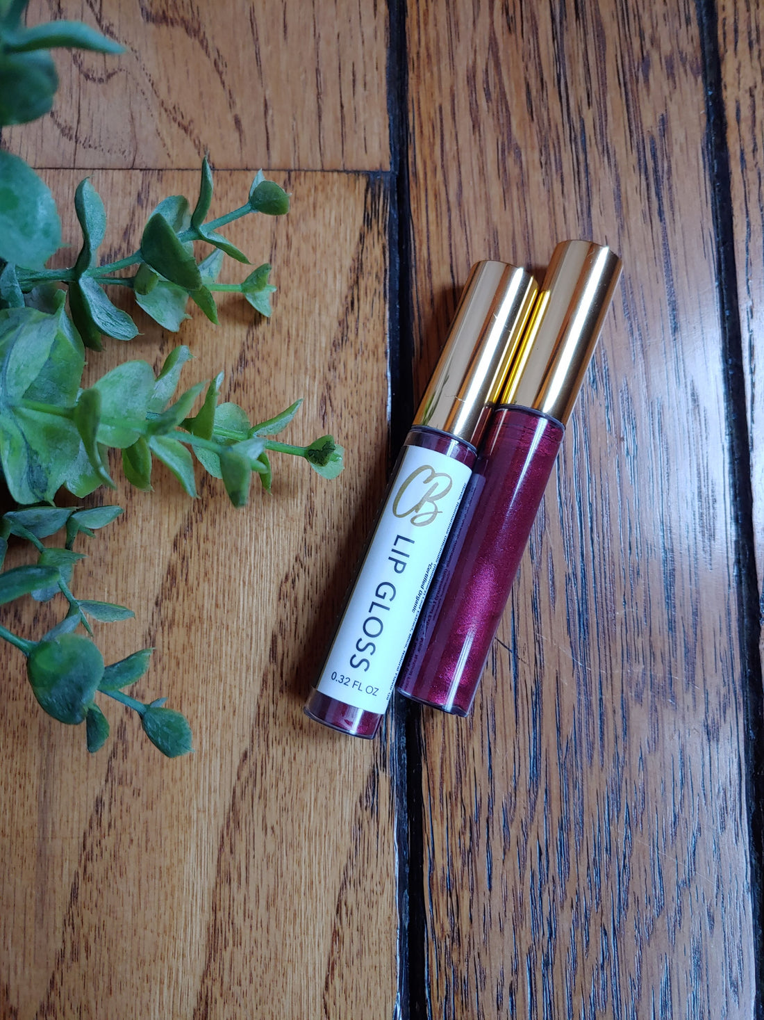 Ruby Perfect Pout Lip Gloss by Clean Beauty by joy. This creamy formula is long-lasting, moisturizing, and made with truly safe ingredients. The organic, vegan, gluten free ingredients are high-performing and are not sticky or tacky. Clean and safe makeup. 